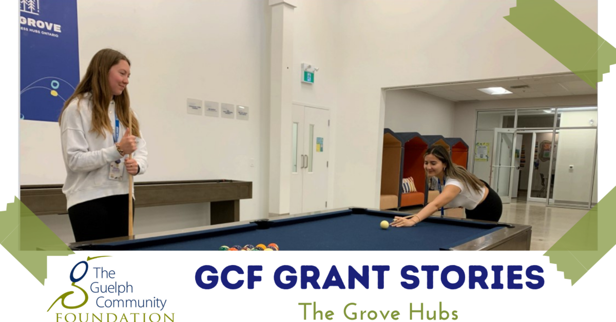 GCF Grant Stories The Grove Hubs: Photo of two teenage girls playing pool in a brightly lit gymnasium like space.