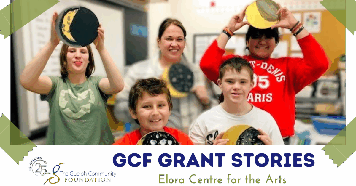 Group of smiling kids holding canvas in a classroom, part of Elora Centre for the Arts program supported by Guelph Community Foundation