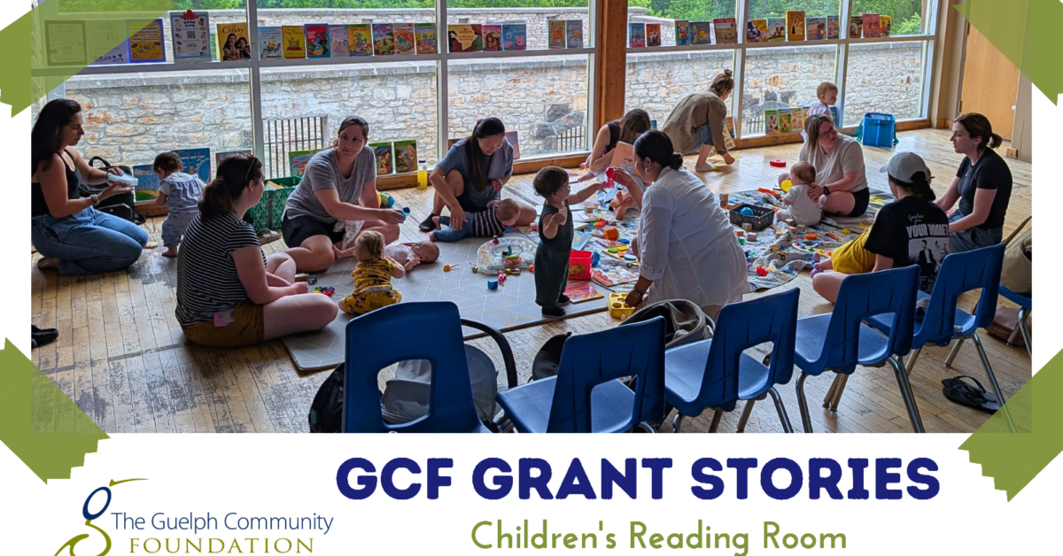Parents and toddlers engaged in interactive play and reading activities in a bright children's reading area with large windows.